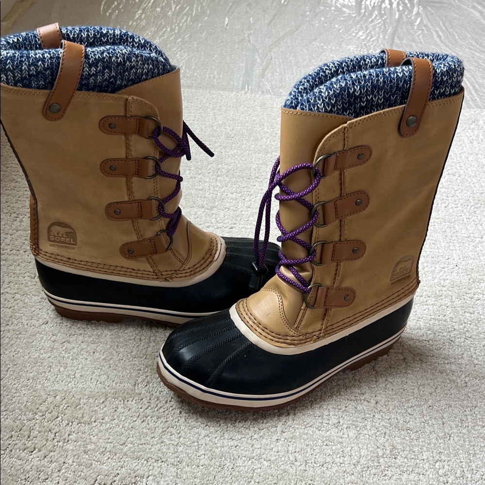 Sorel Tan and Black Boots with Purple Laces